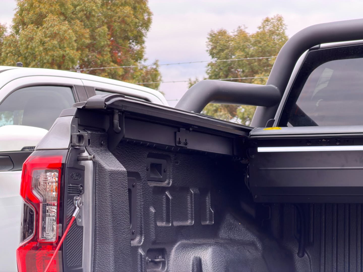 Electric roller cover open — tub detail on Ford Ranger